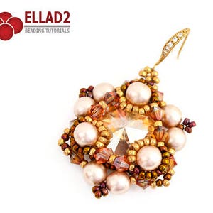 Peut inclure: Une paire de boucles d'oreilles en perles dor&eacute;es et brunes avec un centre en cristal et un motif de perles. Les boucles d'oreilles sont suspendues &agrave; un crochet dor&eacute;.