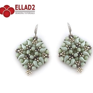 May include: A pair of silver earrings featuring a green and silver beaded design. The beads are arranged in a geometric pattern, creating a unique and stylish look.