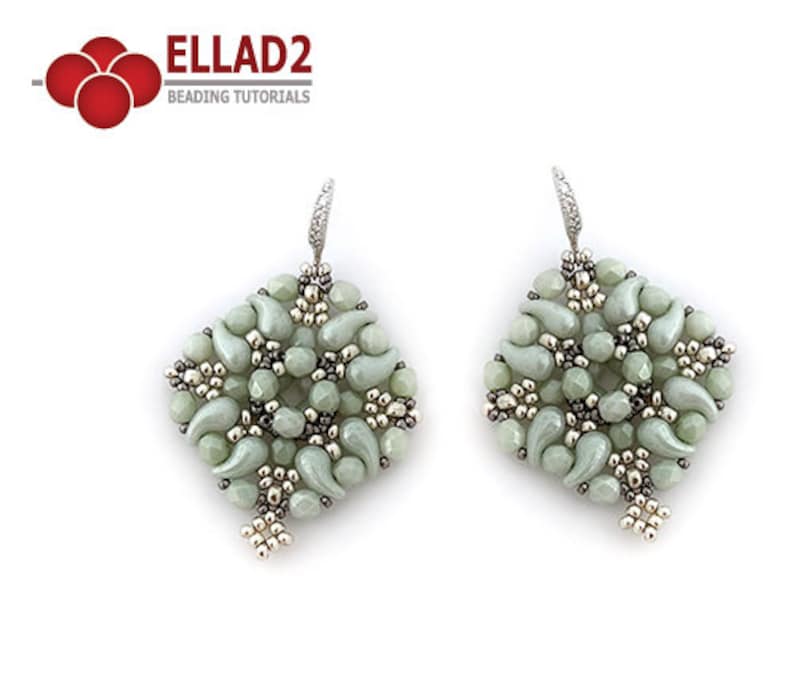May include: A pair of silver earrings featuring a green and silver beaded design. The beads are arranged in a geometric pattern, creating a unique and stylish look.