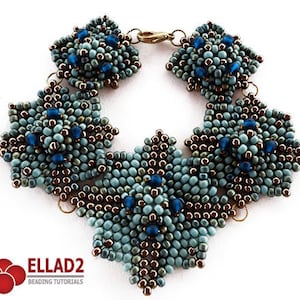 May include: A beaded bracelet with a geometric design featuring blue and brown beads. The bracelet is made with a variety of beads, including seed beads and larger, faceted beads. The bracelet is secured with a clasp.