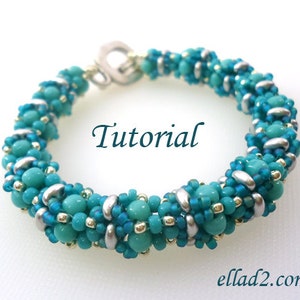 May include: A turquoise and silver beaded bracelet with a clasp closure. The bracelet is made with small seed beads and larger round beads. The bracelet is a tutorial for making a similar bracelet.