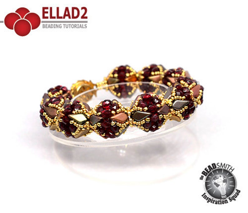 May include: A gold and red beaded bracelet with a geometric design. The bracelet is made with small, faceted beads in shades of red, gold, and brown. The beads are arranged in a repeating pattern of triangles and squares.