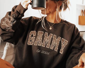 Custom Leopard Gammy Sweatshirt With Kid Name On Sleeve, Personalized Gammy Sweatshirt, Gift For Kiki, Christmas Gift Gammy Est Shirt