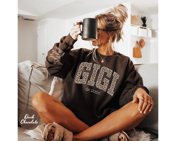 Custom Leopard Gigi Sweatshirt With Kid Name On Sleeve, Personalized Gigi Sweatshirt,Gift For Gigi,Mothers Day Gift,Gigi Est Year Sweatshirt