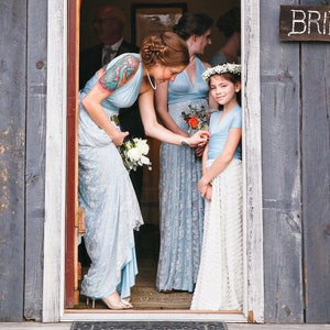Girl in Doorway in  Ruffle Infinity Wrap Dress- 
Cottage Chic, Country Western Wedding.