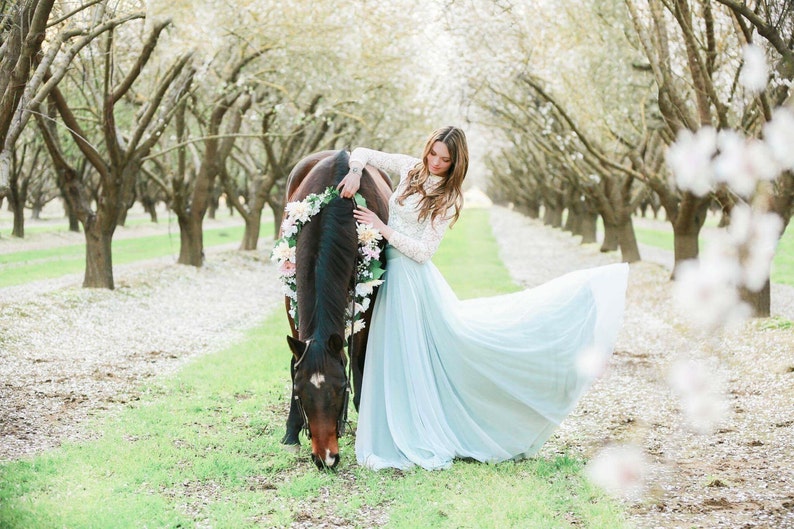 Spring photo of girl with horse In Aqua, Something blue whimsical chiffon skirt.