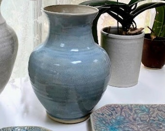 Beautiful powder blue crackle vase with off white inside by Leslie Freeman