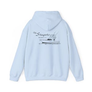 May include: Light blue hoodie with a drawstring hood. The back features a black and white illustration of a boat with the text "The Stugots" and "Belmar, N.J." printed above the boat. The hoodie is a casual garment.