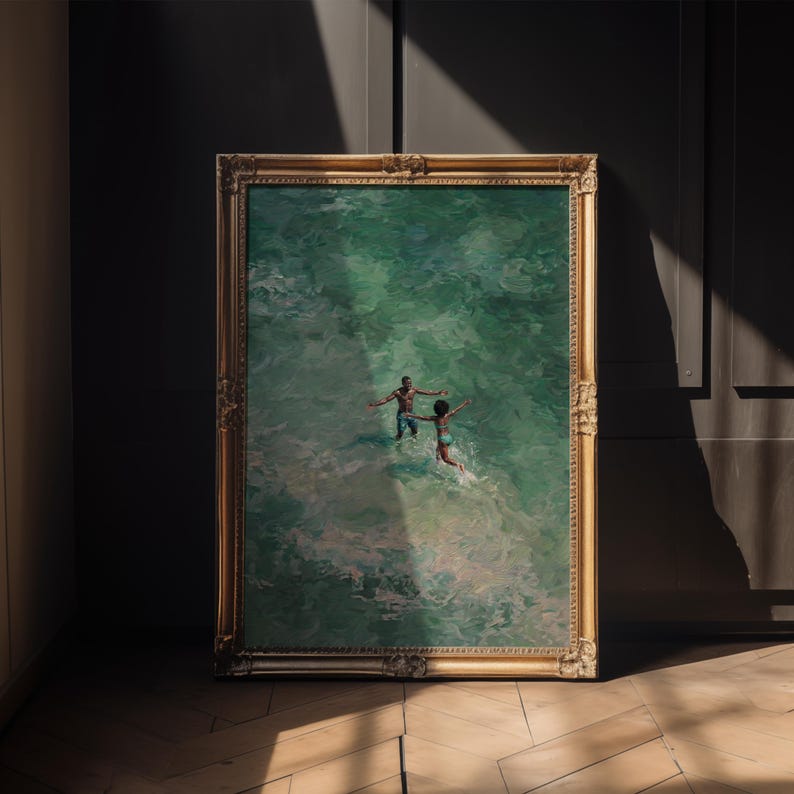 Framed African American art showing a Black couple in turquoise water. This ocean oil painting mockup illustrates romantic beach art and Afrocentric wall art, ideal for coastal summer decor and Black love art enthusiasts.