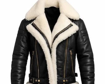 May include: Black leather jacket with a cream-colored shearling lining and collar. The jacket features a zip-up front, multiple pockets, and a belt at the waist. The sleeves have ribbed detailing and the cuffs are trimmed with shearling.