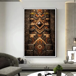 May include: A framed abstract art print with a detailed geometric design in brown, grey, and orange. The artwork has a textured appearance, with a central diamond shape and layered patterns.