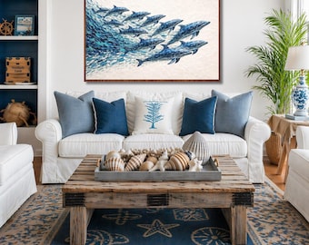 Downloadable PNG digital file of an ocean artwork depicting a family of dolphins in an ocean filled with fish.