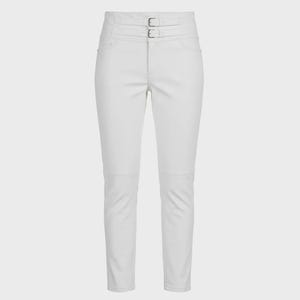 May include: White high-waisted pants with two silver buckles at the waist. The pants have a slim fit and feature knee panel detailing. The overall design is sleek and modern, suitable for various fashion styles.