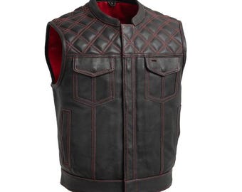 May include: Black leather vest with red stitching and a quilted pattern on the shoulders. Features two front pockets and a red interior lining. A classic biker-style vest.