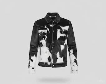 May include: A black and white cowhide-patterned jacket with a button-down front, two chest pockets, and a collar. The jacket has white stitching and a classic western style.