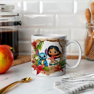 May include: White ceramic mug with a colorful cartoon image of Stitch and Lilo from Disney's Lilo & Stitch. The image shows Stitch and Lilo standing in a tropical setting with flowers and leaves.