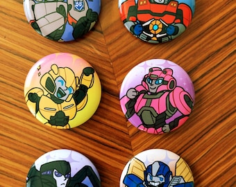 Transformers-spelden/-badges met één druk op de knop (geen restocks zodra uitverkocht)