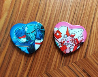 Transformers Megasound & Dratchet hartknopspelden/-badges