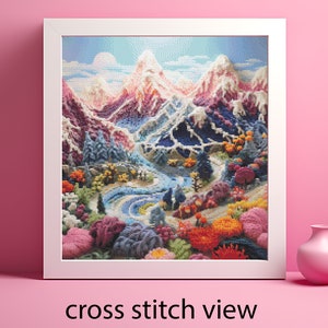 May include: A cross stitch pattern depicting a colourful mountain landscape with a winding river. The mountains are made of yarn and the river is blue. The scene is surrounded by flowers and trees.
