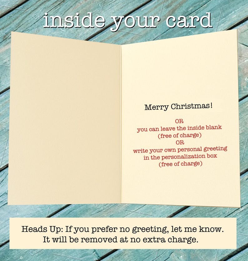 May include: An open greeting card with a cream-colored interior. The right side features black text reading Merry Christmas, followed by red text explaining options to leave the inside blank or add a personal greeting. A note below reads Heads Up.