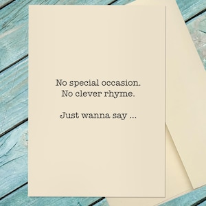 May include: A cream-colored greeting card with the text "No special occasion. No clever rhyme. Just wanna say ..." in black font. The card is paired with a matching envelope, perfect for sending a simple message.