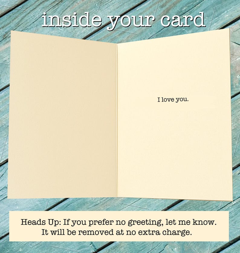 May include: An open greeting card with a cream-colored interior. The text 'inside your card' appears at the top. The right panel features the printed text 'I love you.' A bottom note states: 'Heads Up: If you prefer no greeting, let me know. It will be removed at no extra charge.'