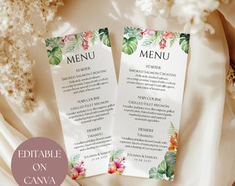 May include: Two wedding menu cards with floral and leaf accents. The cards feature the word "MENU" at the top, followed by the menu items: Smoked Salmon Crostini, Grilled Filet Mignon, and Tiramisu. The text "EDITABLE ON CANVA" is also visible.