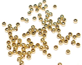 2mm 14kt Gold Filled Round Seamless Spacer or Crimp Beads WHOLESALE LOTS. An Economical Alternative to Solid Gold. Free Shipping Worldwide.