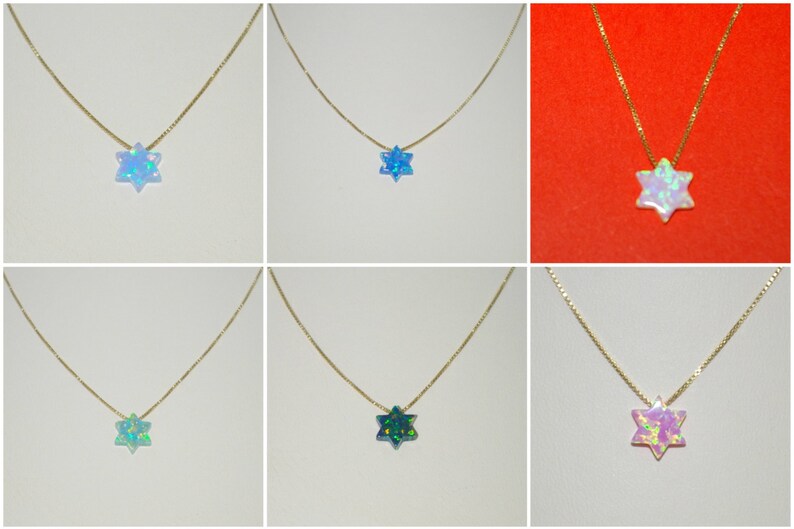 May include: Six gold necklaces with a six-pointed star pendant made of iridescent opal. The necklaces are displayed on a white background. The opals are in various colors, including blue, green, pink, and white.