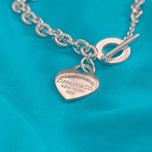 Vintage Tiffany & Co silver necklace . Heart tag and toggle closure , up to 17" lenght