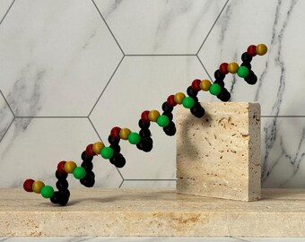 Accessorio per capelli a spirale culturale per locs, trecce, twist, ecc. / Juneteenth. Tradizione nera. Atmosfere rasta. / verde, rosso e oro