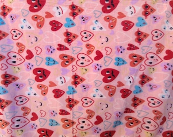 Fleece blanket - smiling heart faces on pink