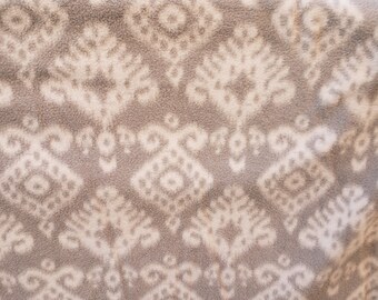 Grey and white fleece blanket