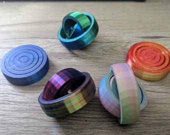 Juguete antiestrés con anillos giratorios