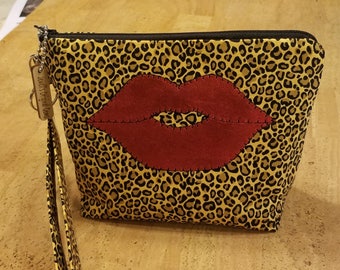LipSense Distributor, direct sales, wrist-let bag, purse, leopard print, holds 21 lipsticks & additional supplies, shimmering red lips