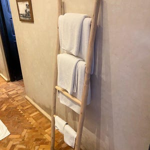 Decorative Wooden Ladder: A Stylish Towel Storage Solution