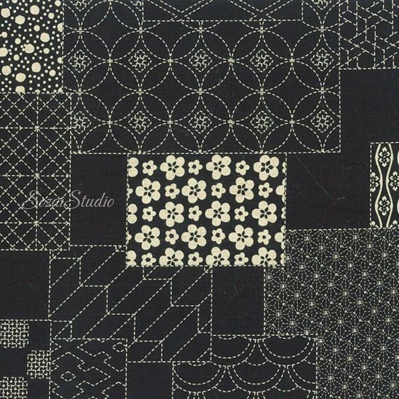 May include: A black fabric featuring a patchwork design of various white geometric and floral patterns. The print includes circles, dots, lines, and flower motifs arranged in rectangular sections. The text "Sizai Studio" is visible on the left.