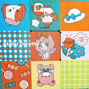 May include: A colorful fabric square featuring various cartoon illustrations. Designs include a dog, a teapot, a hat with a bow, a girl with a bow, flowers, candies, and a bear. The text "Atelier Dorothy" is also visible.