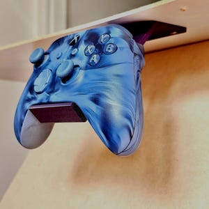Universal controller holder