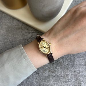 Orologio da donna in stile vintage - Cassa ovale, numeri romani, regalo per lei. Elegante orologio al quarzo - Regalo per lei, orologio minimalista, orologio alla moda.