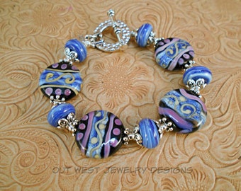 Artisan Lampwork Bracelet - Hand Torched Glass Beads in Navy and Royal Blue with Purple and Olive Accents - Statement Bracelet