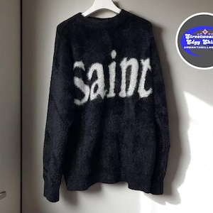 Suéter unissex fofo | Pulôver de malha macia oversized | Suéter aconchegante com gola redonda | Manga comprida com estampa de letras | Moletom casual preto