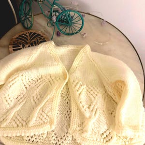 Hand knitted one of a kind baby cardigan