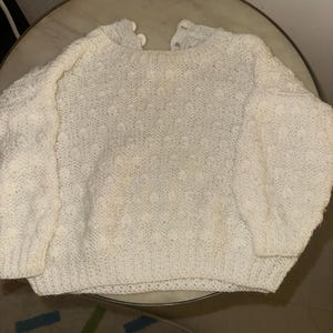 Newborn hand knitted cardigan