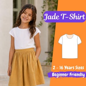 May include: A white short-sleeved t-shirt with a round neckline and a mustard yellow skirt. The image includes text reading Jade T-Shirt and 2 - 16 Years Sizes Beginner Friendly, alongside a white line drawing of the t-shirt design.