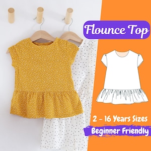 May include: A sewing pattern for a flounce top for children. The pattern includes a white illustration of the top and a photo of a yellow and white polka dot top. The text on the pattern reads "Flounce Top", "2 - 16 Years Sizes", and "Beginner Friendly".