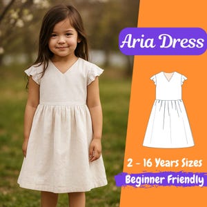 May include: A young girl wearing a light beige Aria dress with a V-neck and flutter sleeves. The dress has a gathered waist and a knee-length skirt. The image includes a diagram of the dress and text that reads "Aria Dress", "2 - 16 Years Sizes", and "Beginner Friendly".
