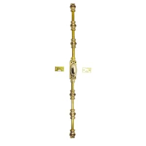 May include: A vertical brass door bolt with decorative detailing. The bolt features an oval center piece, multiple ornate rings, and square end caps. Two small brass plates are included. The hardware is designed for door security and adds a touch of elegance.