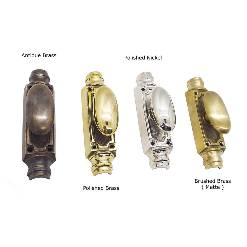May include: Four different metal door knobs are displayed against a white background. The knobs are in antique brass, polished brass, polished nickel, and brushed brass (matte) finishes. Each knob has an oval handle and a rectangular base. The text labels each finish.
