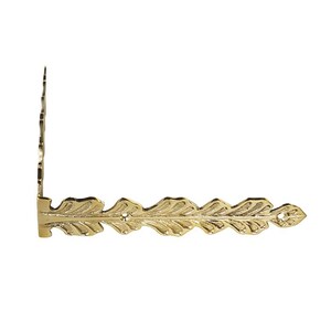 May include: Gold metal corner bracket with a decorative leaf design. The bracket has a right angle and is designed to be used as a decorative corner piece.